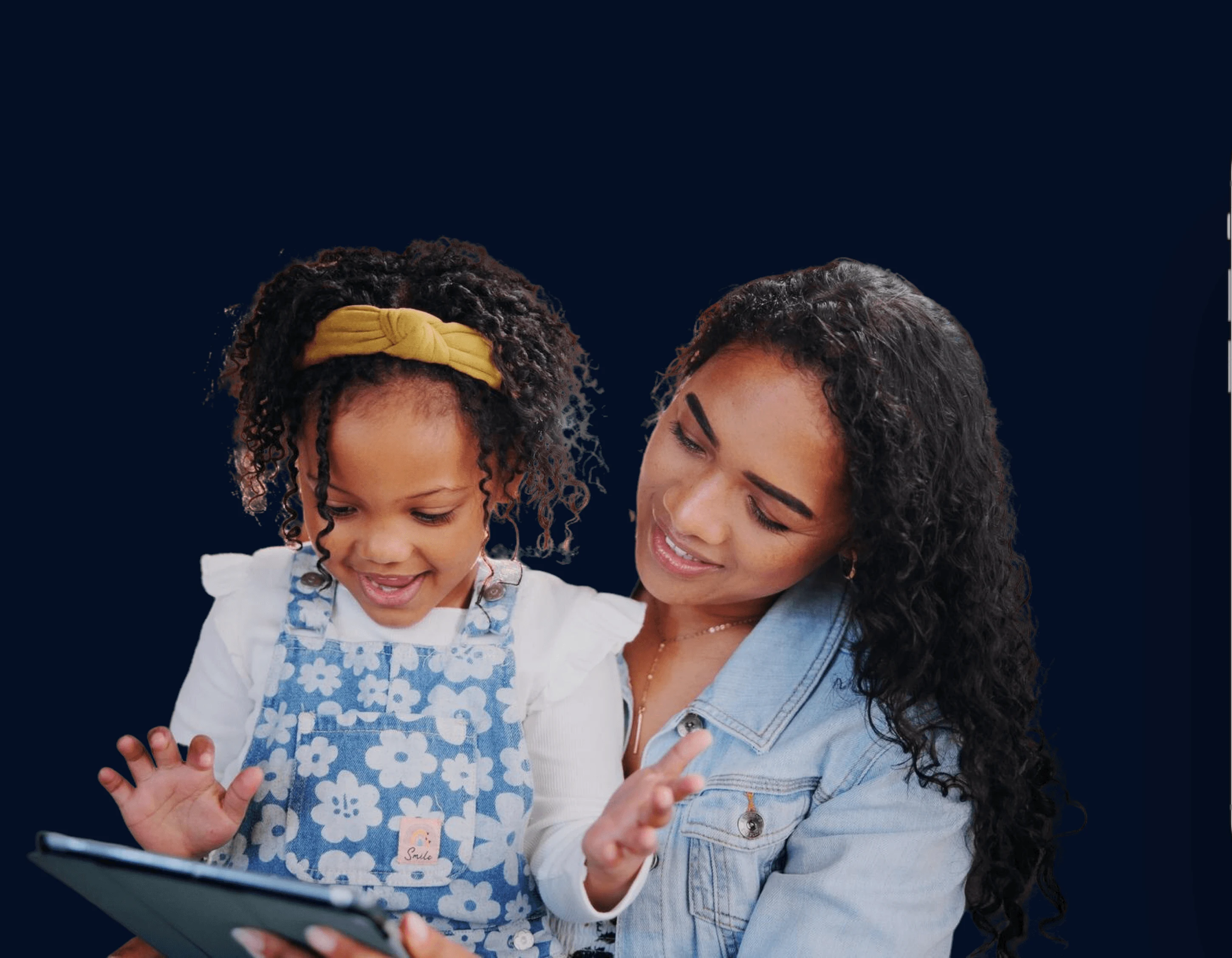 Parent and child learning together on a tablet with education software by Appther